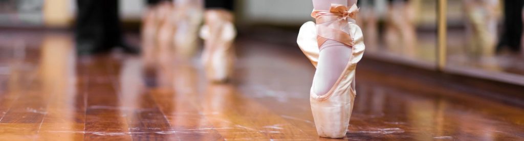 classic ballet shoes in pointe position, maidstone dance studios